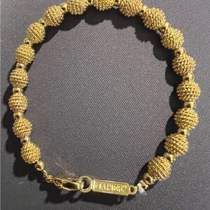 Gold vintage Napier bracelet. Classic gold beads in two sizes.